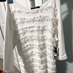 It’s a never worn before NIC+ZOE sweater in size 1X. It is originally $178.